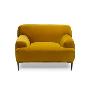 A golden velvet armchair