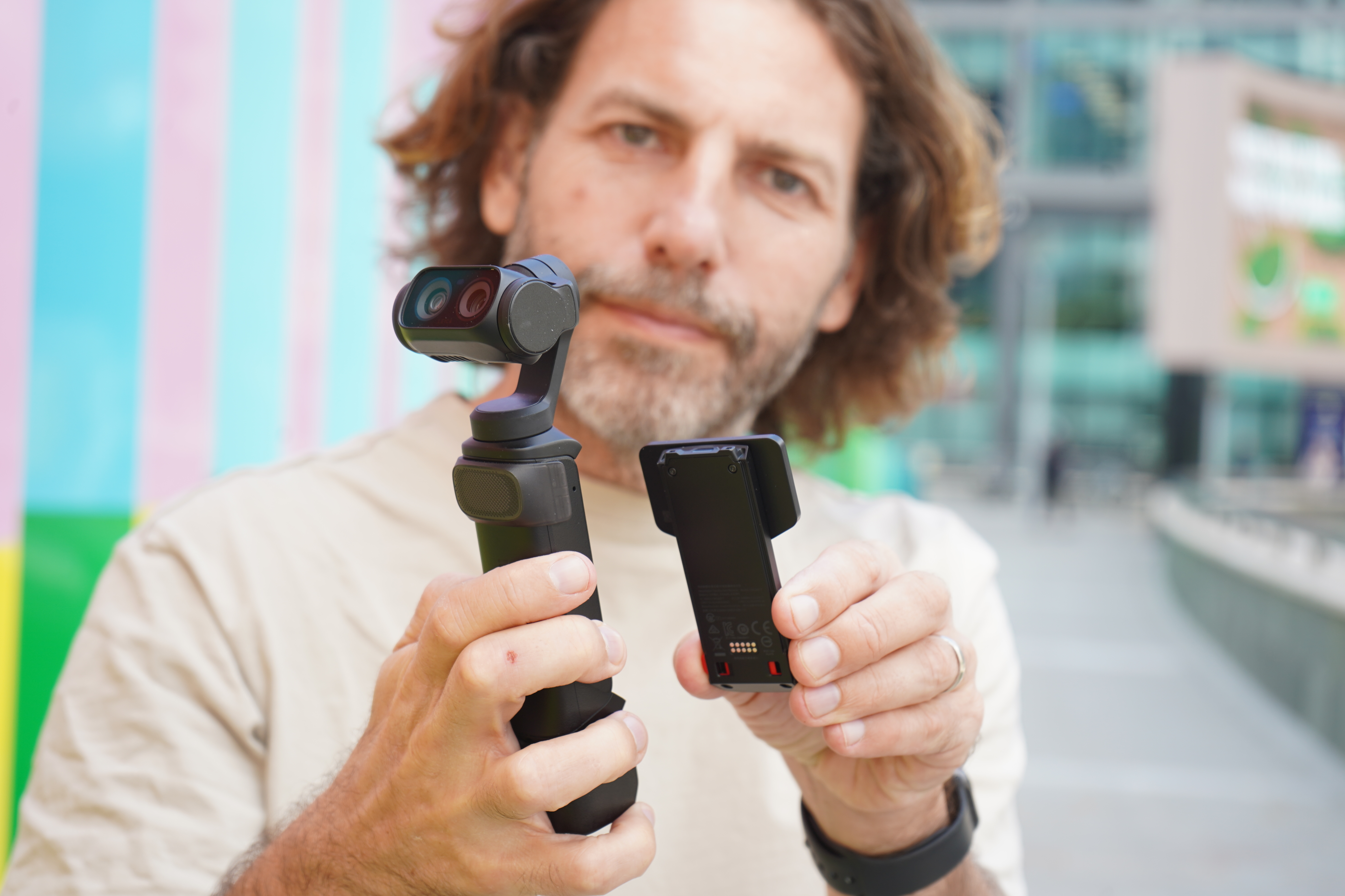 Insta360 Luna Ultra held by Adam Juniper
