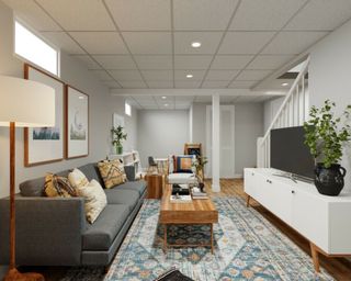 A basement living space with a white criss-cross ceiling