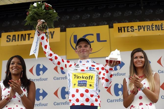 Rafal Majkain polka dots and on the podium