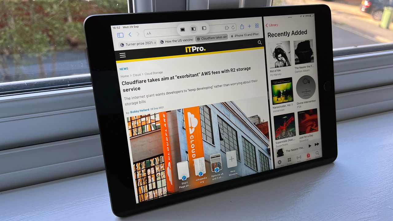 A photograph of the 12.9in 2021 Apple iPad Pro resting on a windowsill