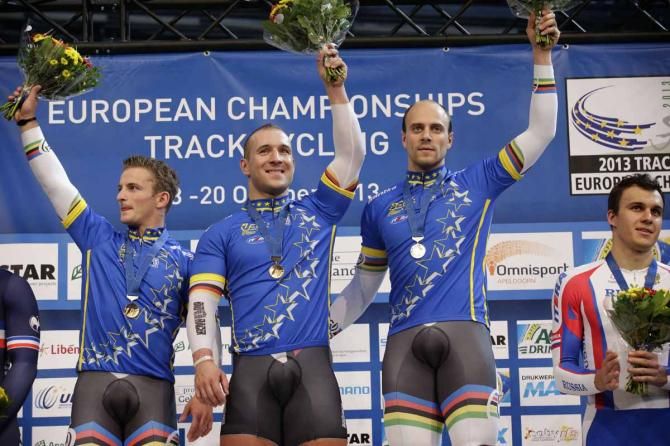 The German team sprinters show their muscles on the podium