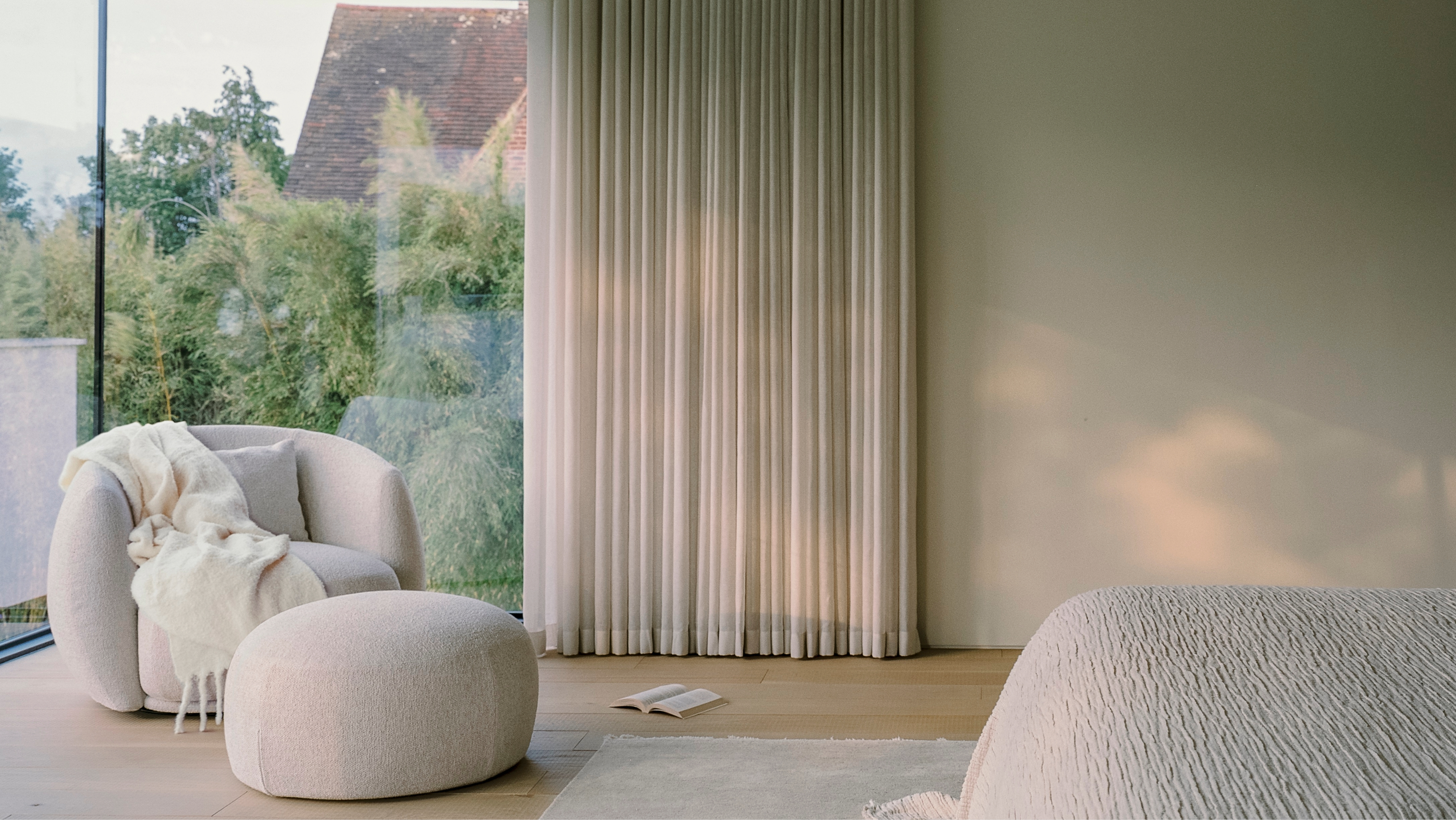 Wave-fold curtains in a contemporary bedroom