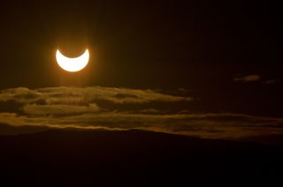 During a partial solar eclipse, the moon takes a “bite” out of the sun. 