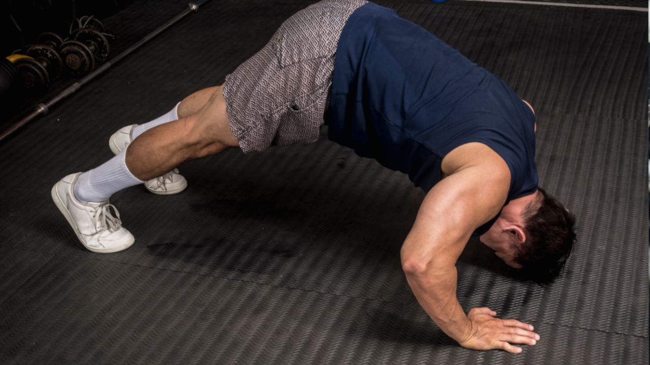 Man doing pike push up