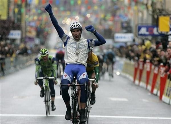 Gert Steegmans (Quick Step) celebrates with a little on the bike victory dance.