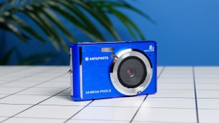 A blue AgfaPhoto Realishot DC5500 compact camera