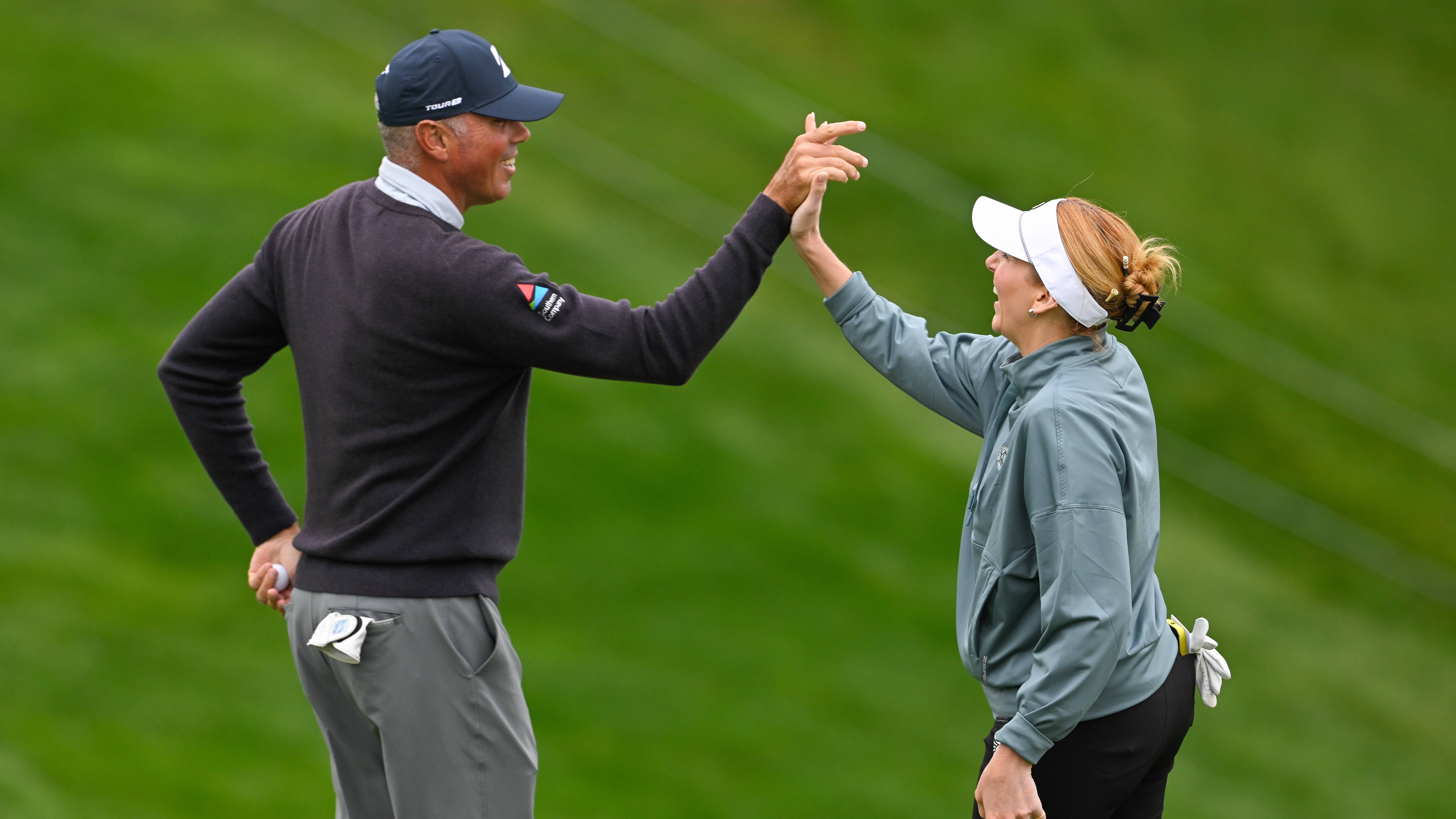 Matt Kuchar high fives with Hally Leadbetter at the 2025 Memorial Tournament at Muirfield Village