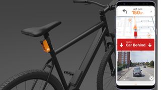 Bicycle and phone showing app in action