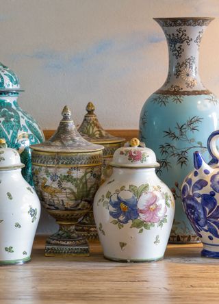 picture of antique vases in a row