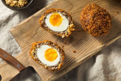 Three scotch eggs - one of the meals suggested to be 'substantial' under new government rules for tier 2
