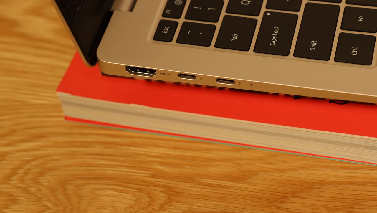 Samsung Galaxy Book3 on a wooden table