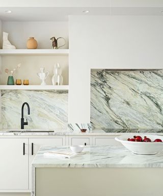 white kitchen with marble surface
