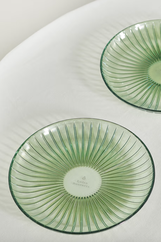 two green glass ridged fruit plates