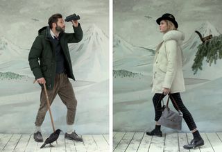 Left: Illustrated snow scene, grey snowy sky and white mountainous background, white wooden floor, male model in winter wear, looking through binoculars and holding a wooden cane, blackbird sat at his feet. Right: Illustrated snow scene, grey snowy sky and white mountainous background, white wooden floor, side view of a female model, holding a grey handbag