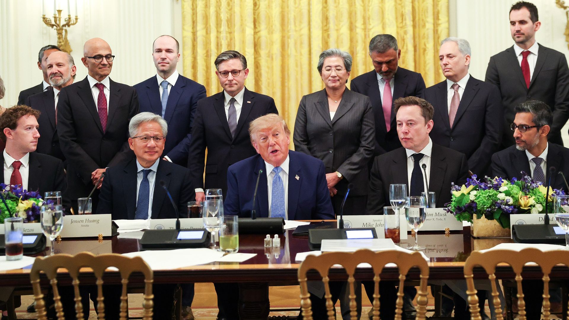 WASHINGTON, DC - SEPTEMBER 29: U.S. President Donald Trump makes a statement while he is seated with (L-R) CEO of Meta Platforms Mark Zuckerberg, Nvidia CEO Jensen Huang, Tesla, SpaceX and X CEO Elon Musk, and Google CEO Sundar Pichai during a meeting with AI executives in the East Room of the White House on September 29, 2026 in Washington, DC. The meeting comes as some have called for a slowdown in AI development amid rising safety concerns. (Photo by Kevin Dietsch/Getty Images)