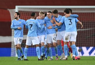 Phil Foden celebrates his goal with Manchester City teammates