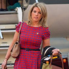 Kate Middleton's former PA and Stylist Natasha Archer carries items of luggage as she arrives at Tezpur Airport on April 12, 2016 in Assam, India