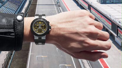 The Bulgari x Gran Turismo watch on a wrist above a racetrack