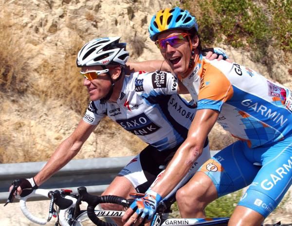 Garmin's David Millar congratulates new dad Stuart O'Grady, who's wife had their third child today.