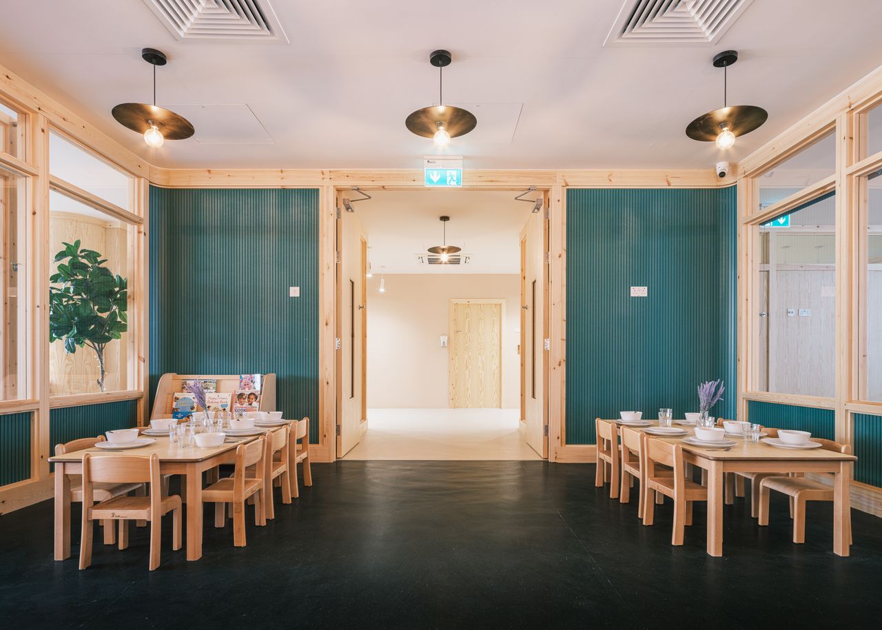 green and wooden interior of The Learning Tree nursery