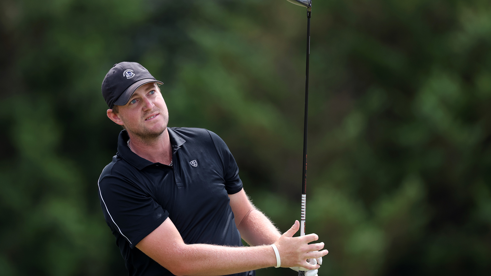 Spencer Tibbits hits a driver off the tee