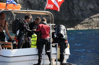 divers at the Antikythera shipwreck site