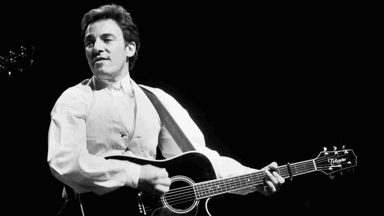 Bruce Springsteen performing onstage in 1988