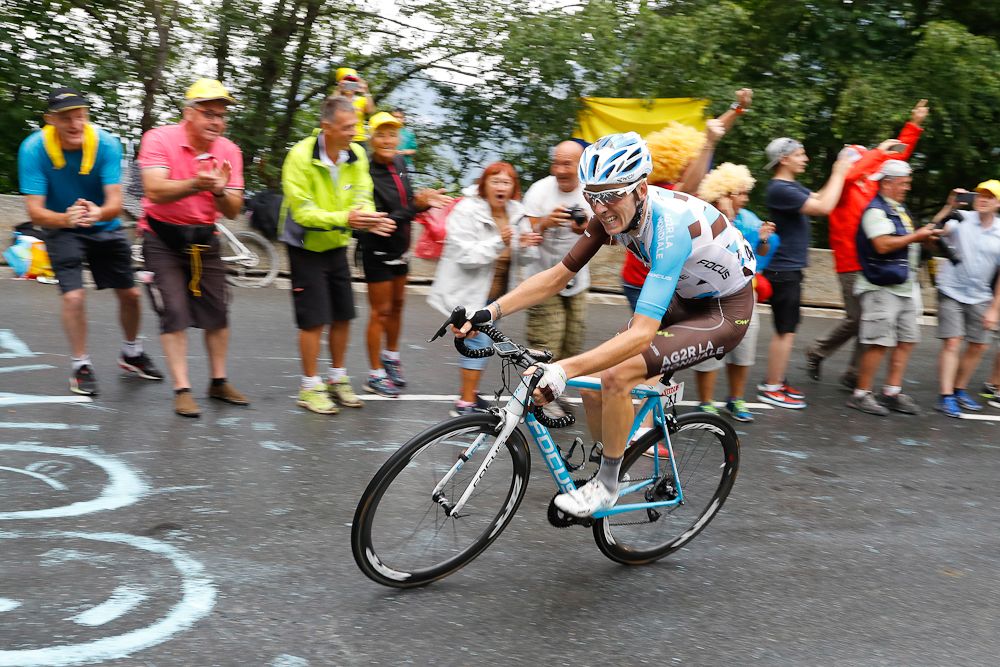 Romain Bardet (Ag2R) rides solo toward the finish of stage 19