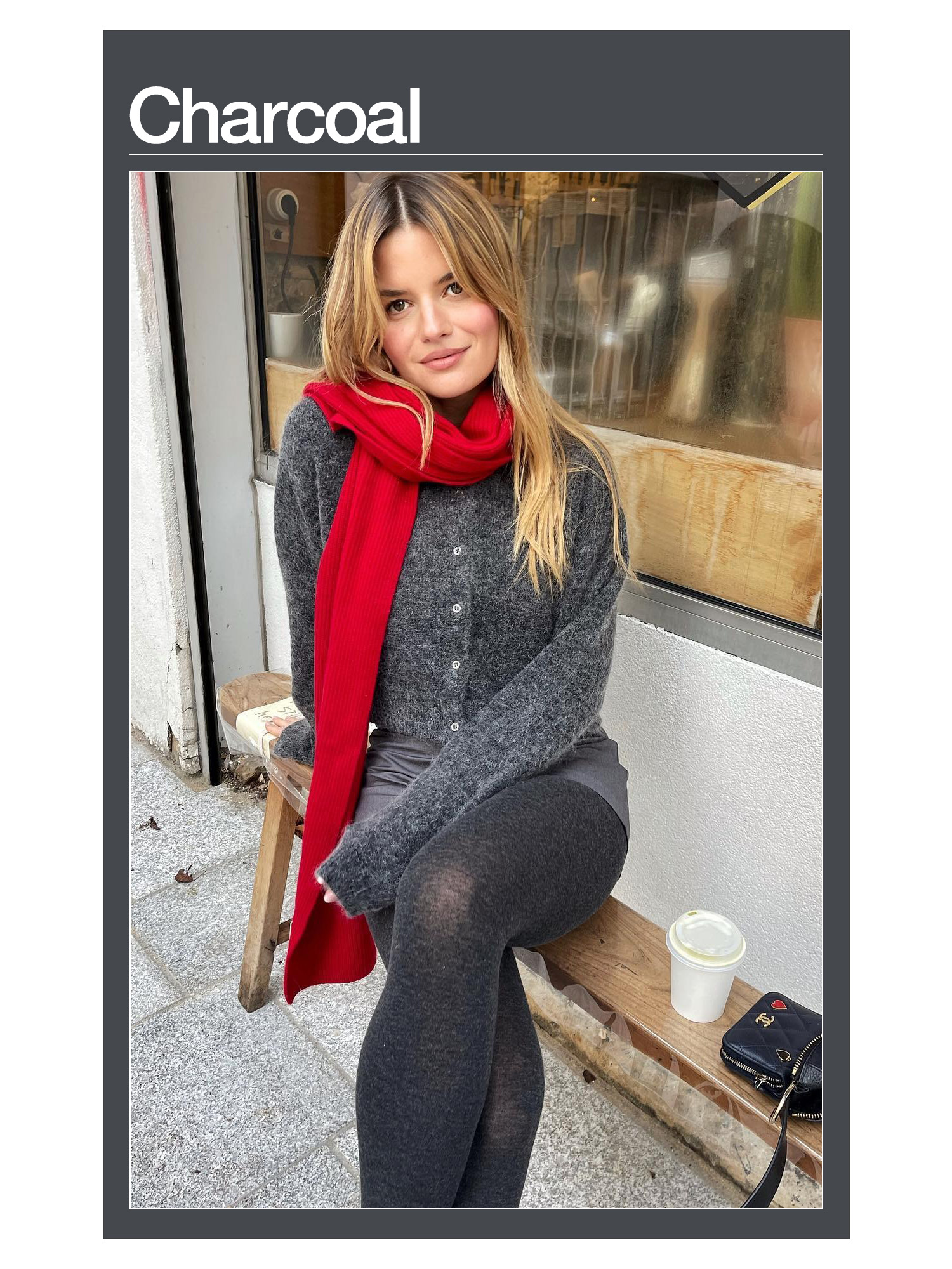 Sabina Socol wearing a charcoal grey sweater