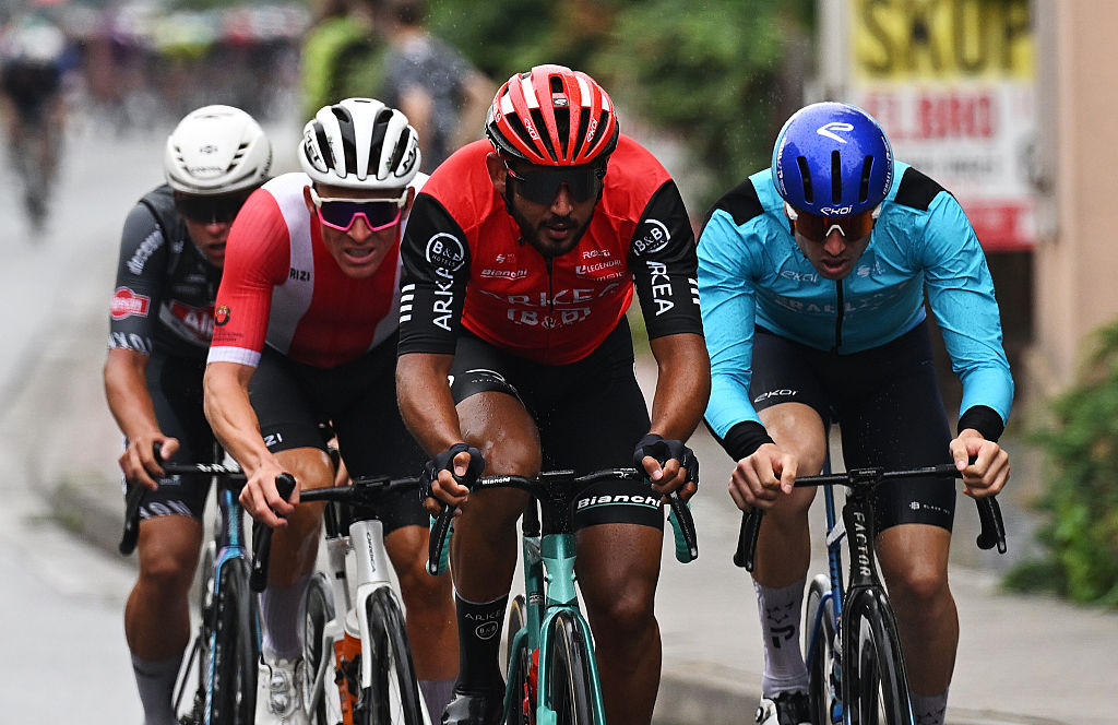 LEGNICA, POLAND - AUGUST 04: (L-R) Patryk Stosz of Poland and Team Poland, Donavan Grondin of France and Team Arkea - B&B Hotels and Nadav Raisberg of Israel and Team Israel - Premier Tech compete in the breakaway during the 82nd Tour de Pologne 2025, Stage 1 a 199.7km stage from Wroclaw to Legnica on August 04, 2025 in Legnica, Poland. (Photo by Luc Claessen/Getty Images)