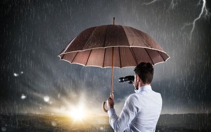 Man under umbrella