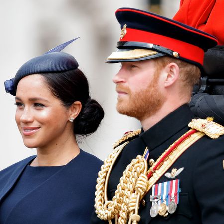 Uniform, Military officer, Military uniform, Fashion, Official, Headgear, Military person, Gesture, Fashion accessory, Police officer, 