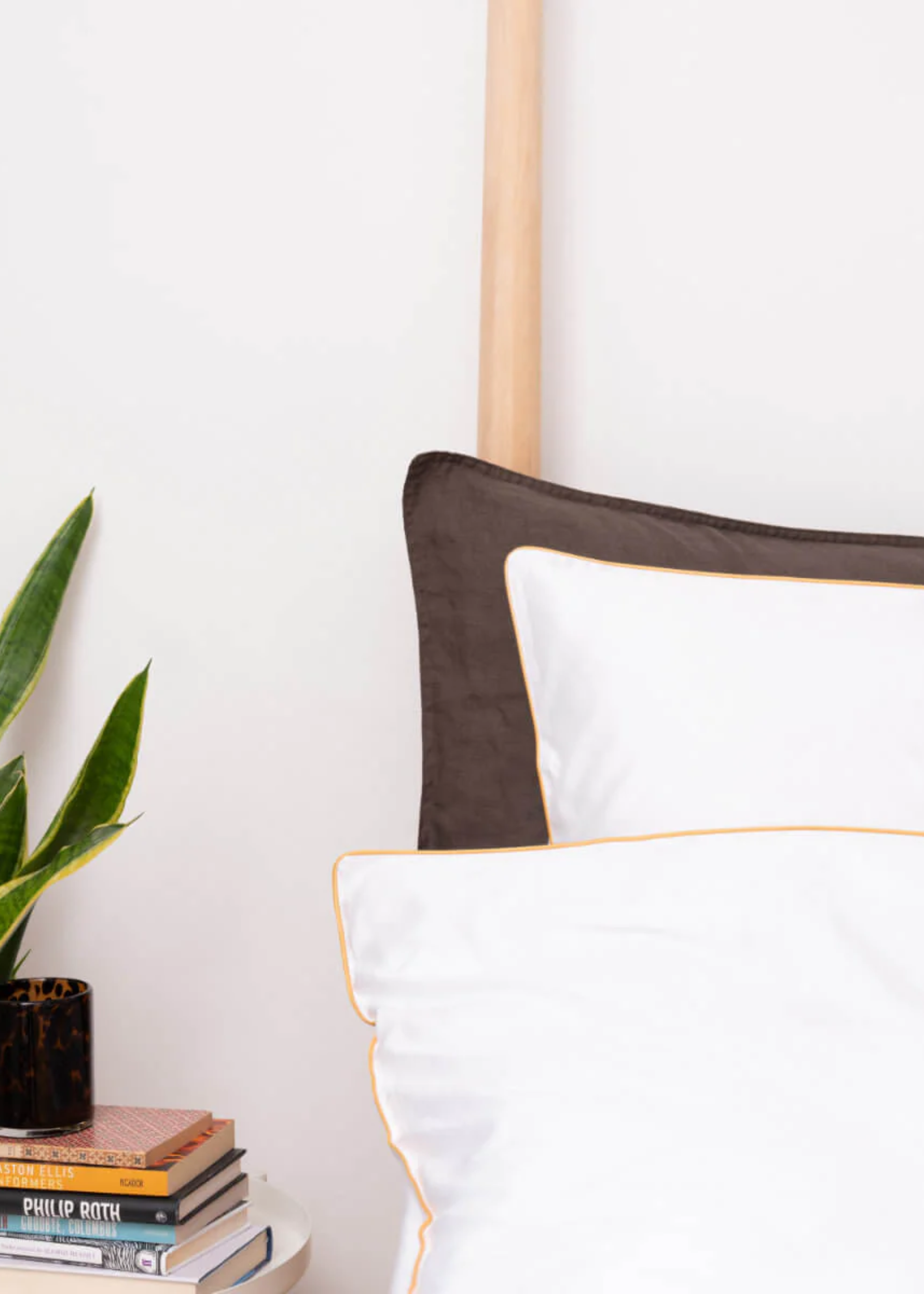A close-up of bamboo bedding with ochre lining