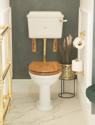 traditional toilet with wooden seat