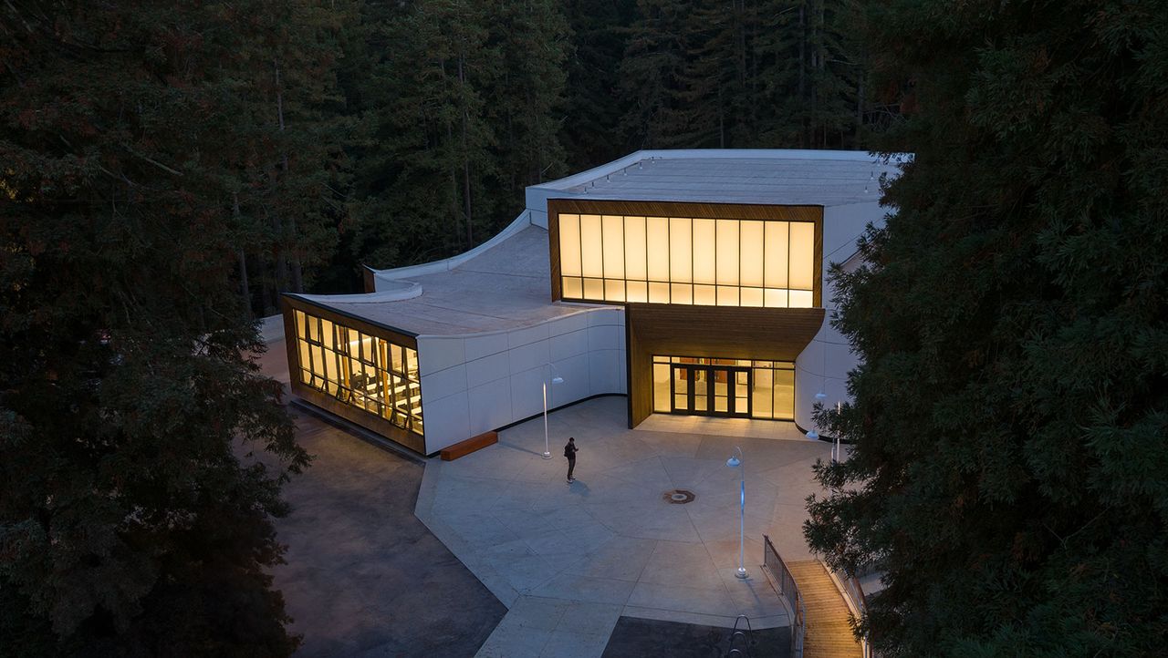 dusk aerial of flowing curves of Kresge College extension by Studio Gang