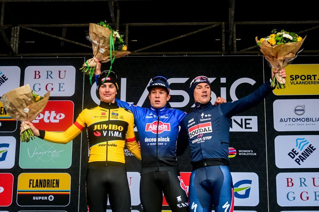JumboVismas Dutch rider Olav Kooij L AlpecinDeceunincks Belgian rider Jasper Philipsen and Soudal QuickSteps Belgian rider Yves Lampaert celebrate on the podium after the mens elite race of the Classic BruggeDe Panne oneday cycling race 2074km from Brugge to De Panne on March 22 2023 Photo by DIRK WAEM Belga AFP Belgium OUT Photo by DIRK WAEMBelgaAFP via Getty Images