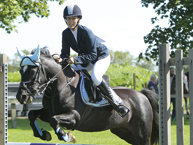 Louise Tullett and Jet winning the senior 70cm championship at Hickstead's Sunshine Tour unaffiliated championships 2015