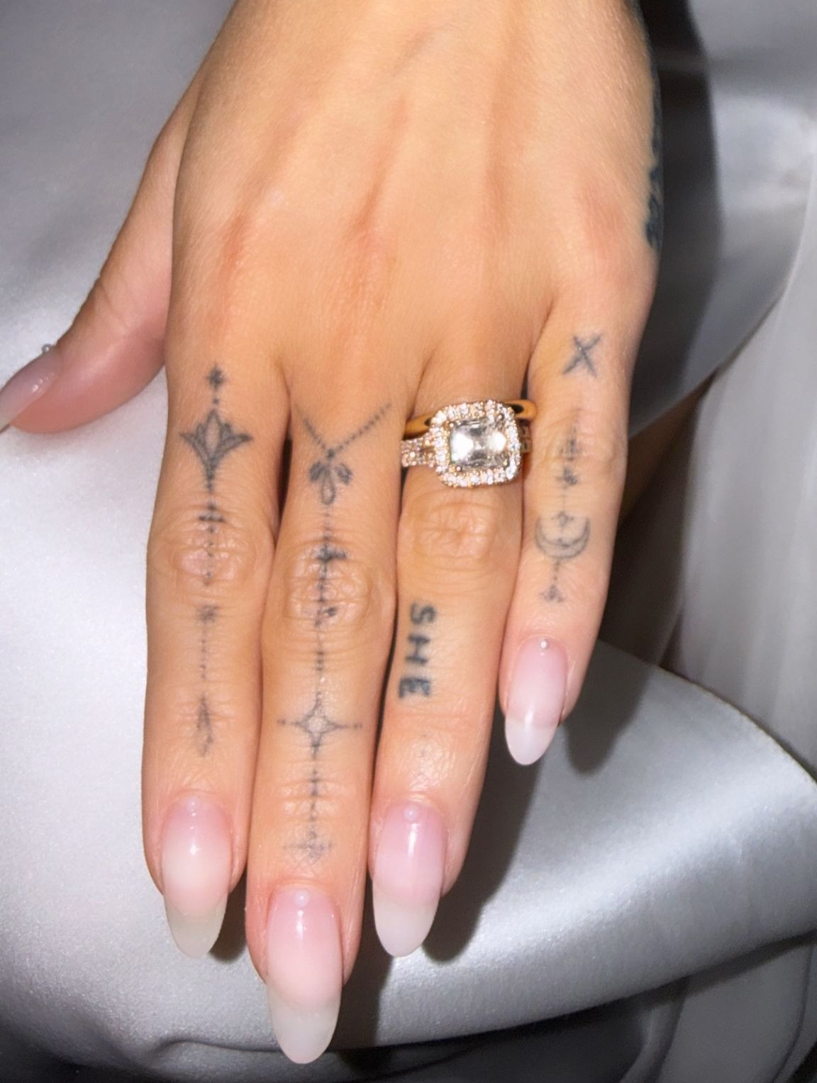 Dove Cameron's simple nude wedding manicure.