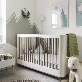 bedroom with white grey designed wall kids bed and frames on wall