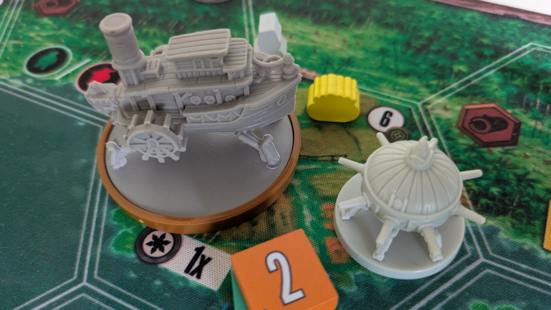 Two Duel of Meloch miniatures stood facing one another