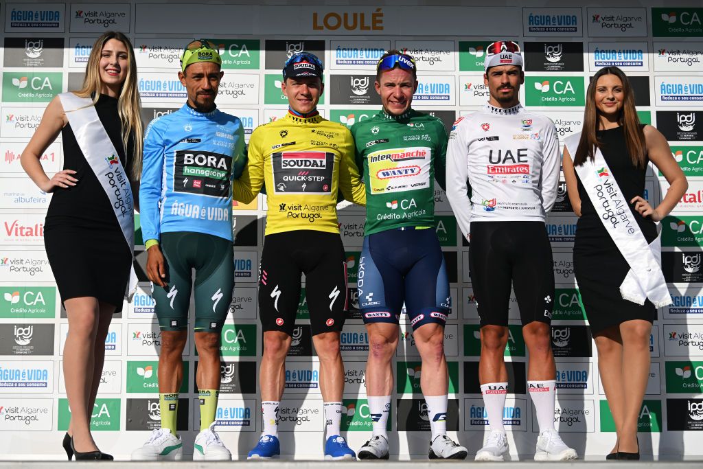 ALTO DO MALHAO PORTUGAL FEBRUARY 18 LR Daniel Felipe Martinez of Colombia and Team BORA hansgrohe Blue Mountain Jersey Remco Evenepoel of Belgium and Team Soudal Quick Step Yellow leader jersey Gerben Thijssen of Belgium and Team Intermarche Wanty Green Points Jersey and Antonio Morgado of Portugal and UAE Team Emirates White Best Young Rider Jersey pose on the podium ceremony after the 50th Volta ao Algarve em Bicicleta 2024 Stage 5 a 1658km stage from Faro to Alto do Malhao 514m on February 18 2024 in Alto do Malhao Portugal Photo by Dario BelingheriGetty Images