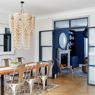dining area with table and metal chairs