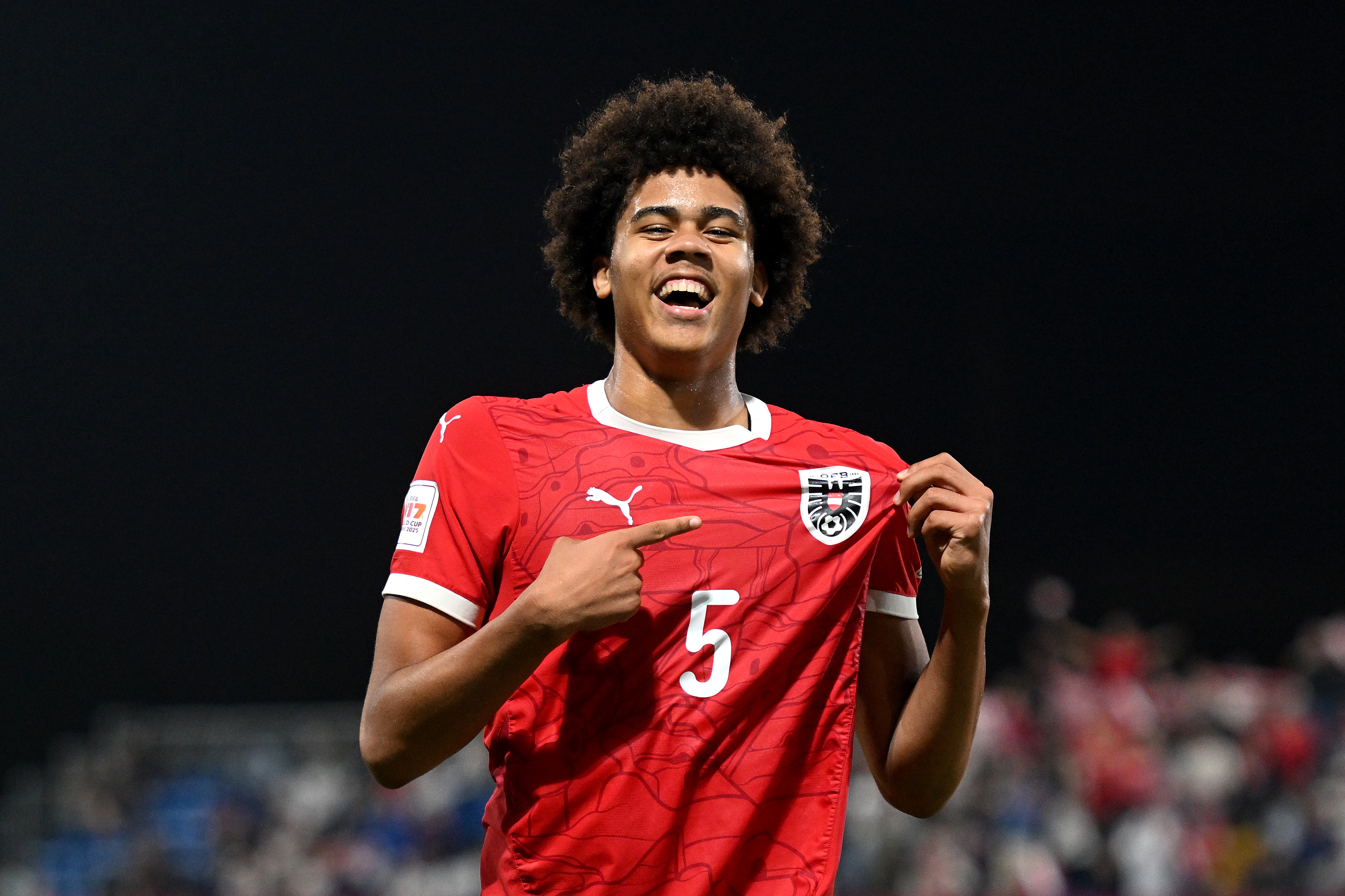 DOHA, QATAR - NOVEMBER 18: Ifeanyi Ndukwe of Austria celebrates scoring his team&amp;amp;apos;s fourth goal during the FIFA Under-17 World Cup Round of 16 match between Austria and England at Aspire Academy on November 18, 2025 in Doha, Qatar. (Photo by Jurij Kodrun - FIFA/FIFA via Getty Images)