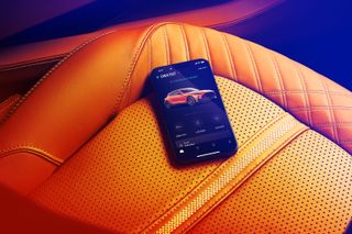Inside Aston Martin DBX707: phone on seat