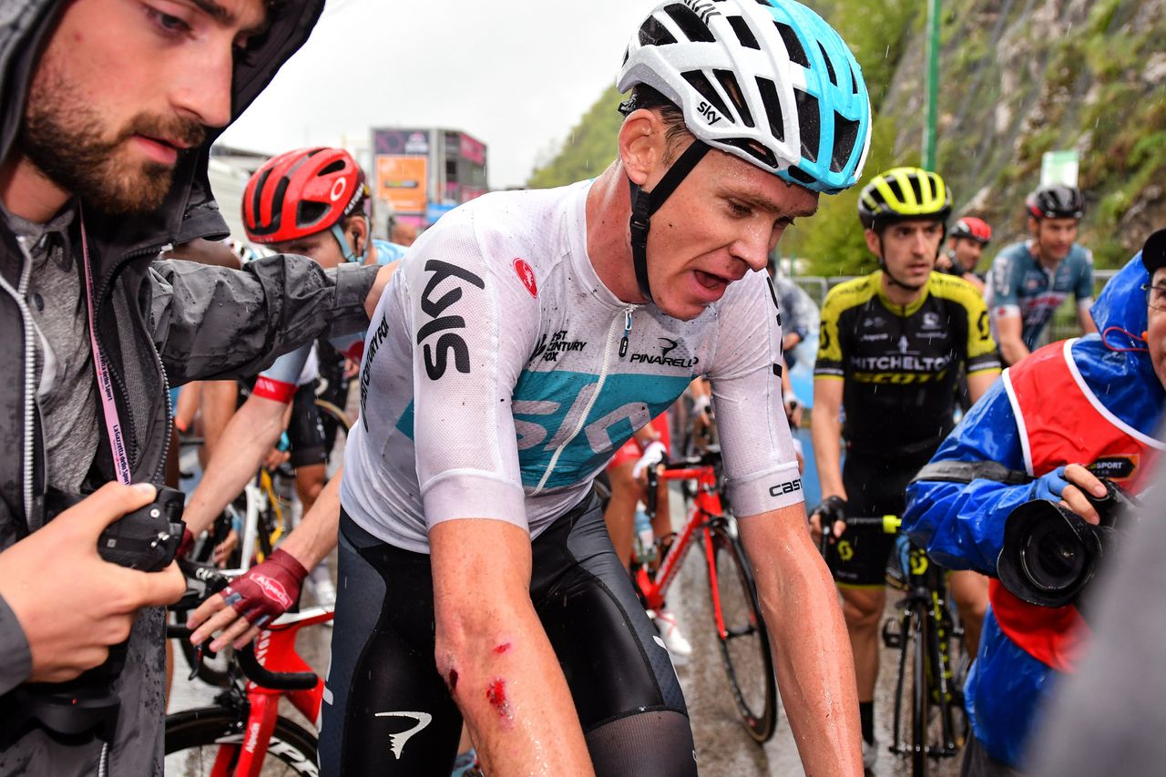 Chris Froome got banged up in the wet final climb