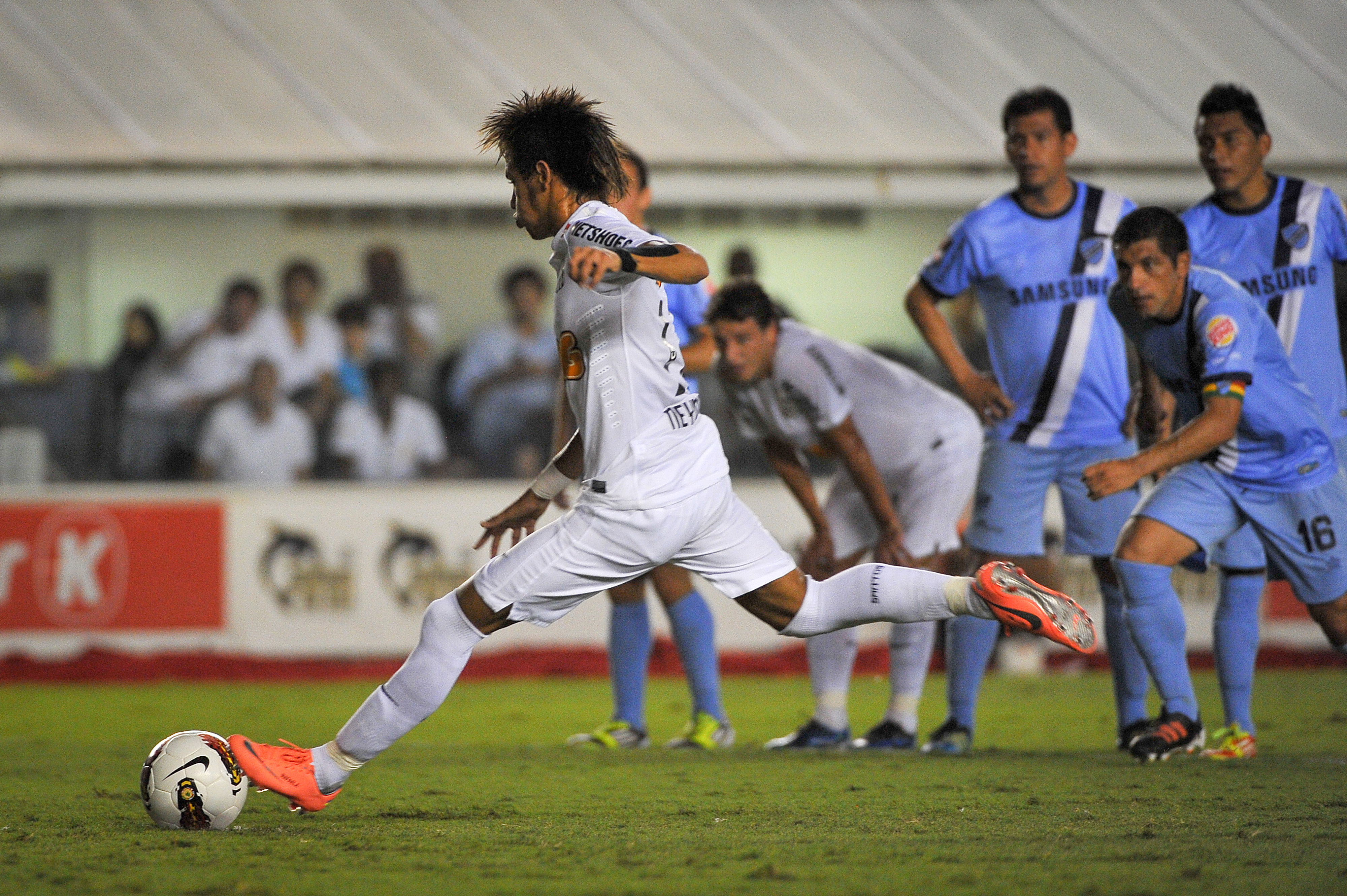 Neymar takes a penalty for Santos in the Copa Libertadores in May 2012.