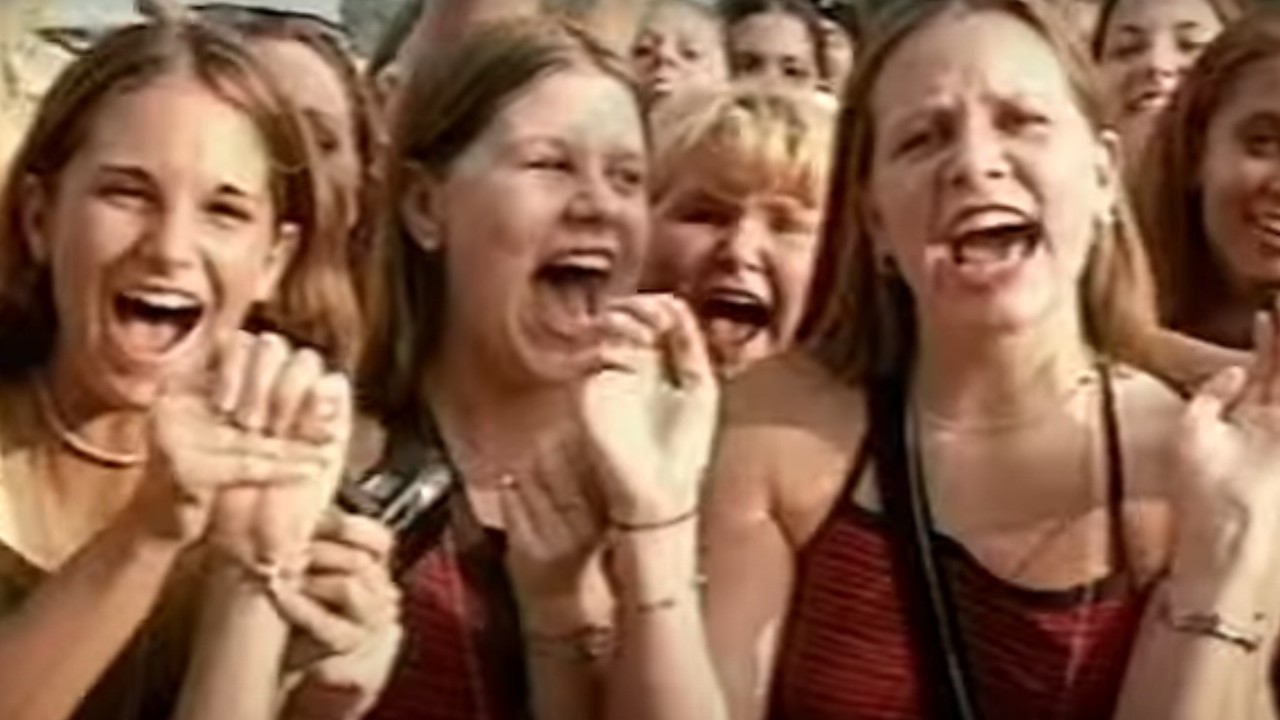 Fans screaming for their favorite band in Larger Than Life: Reign of the BoyBands