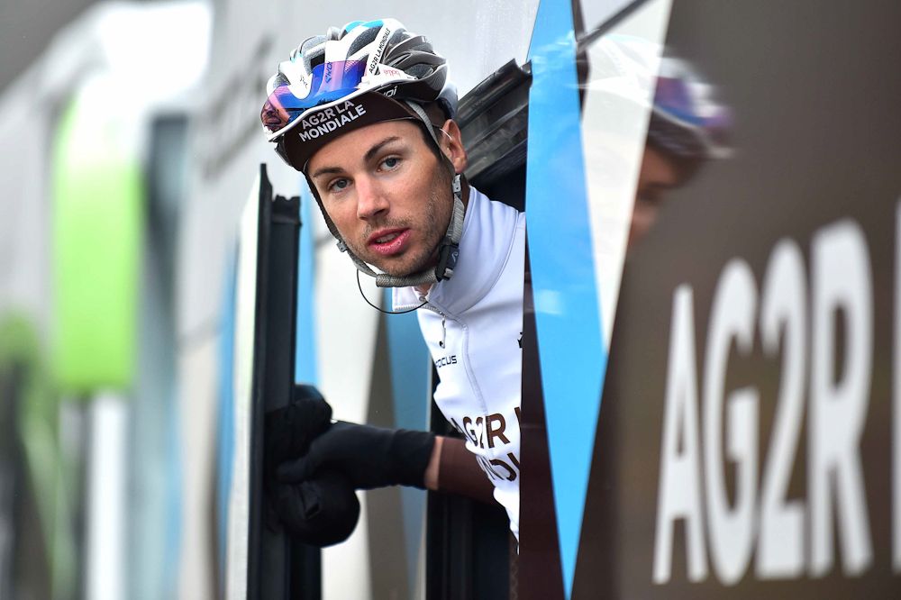Mikael Cherel pops his head out of the Ag2r team bus.