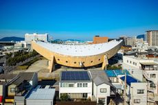 Kagawa Prefectural Gymnasium, Kenzo Tange's modernist gymnasium known as the 'ship gymnasium' in Japan, a curved concrete structure currently under threat of demolition due to neglect